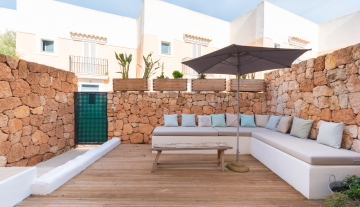 Resa estates Ibiza playa Cala Tarida for sale te koop first garden.jpg